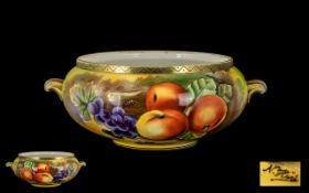 Porcelain Painted Bowl with Gilt Side Handles, depicting fruit on a mossy bank, signed N.