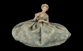 Edwardian Bisque Head and Shoulders Tea Cosy, in the form of an elegant lady with a fine hairstyle,