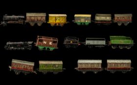 A Collection of Mostly Tin Plate Carriages & Rolling Stock, some in need of attention,