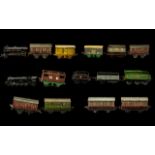 A Collection of Mostly Tin Plate Carriages & Rolling Stock, some in need of attention,