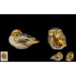 Two Royal Crown Derby Hand Painted Paperweights, comprising,