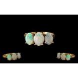 Ladies 9ct Gold Attractive 3 Stone Opal Set Dress Ring. Fully hallmarked for 9.375. Ring size Q.