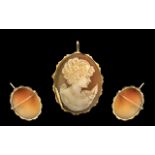 9ct Gold Mounted Shell Cameo Combined Pendant/Brooch, depicting the portrait bust of a young woman.