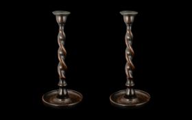 Pair of Oak Barleytwist Candlesticks with brass sconces, c1930s; 12 inches (30cms) high.