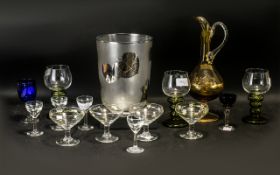 A Mixed Lot of Glass Ware comprising of an amber coloured glass decanter, three Hoch glasses,