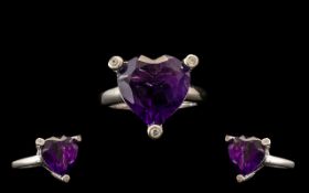 Amethyst Heart Shape and Feature Setting Ring, a 9ct heart cut, deep purple amethyst held in an