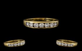 18ct Gold Attractive 7 Stone Diamond Set Ring marked 750 - 18 ct. The round brilliant cut diamonds