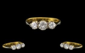 Ladies 18ct Yellow Gold and Platinum Three Stone Diamond Set Ring of excellent quality,