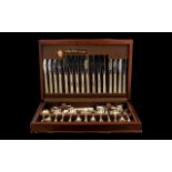 An Arthur Price Canteen of Cutlery, in mahogany fitted case, place setting for 8, to include knives,