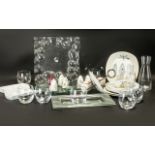 A Modern Carafe and Eight Glasses Set plus 3 glass serving dishes.