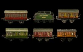 Hornby Tinplate 00 Gauge British Railways Coaches and Tenders from the 1920s,