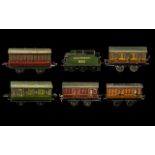 Hornby Tinplate 00 Gauge British Railways Coaches and Tenders from the 1920s,