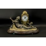 A Reproduction Cast Brass Mantle Clock with a white enamel dial,