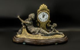 A Reproduction Cast Brass Mantle Clock with a white enamel dial,