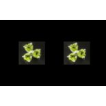 Peridot 'Shamrock' Stud Earrings, each earring comprising three heart cut peridots,