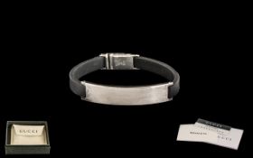 Ladies Silver Gucci Bracelet with black leather strap and silver clasp,