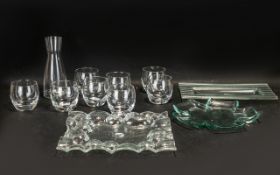 A Modern Carafe and Eight Glasses Set pl