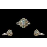 Opal Seven Stone Cluster Ring, an oval c