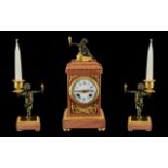 French Clock Garniture. A pink marble a