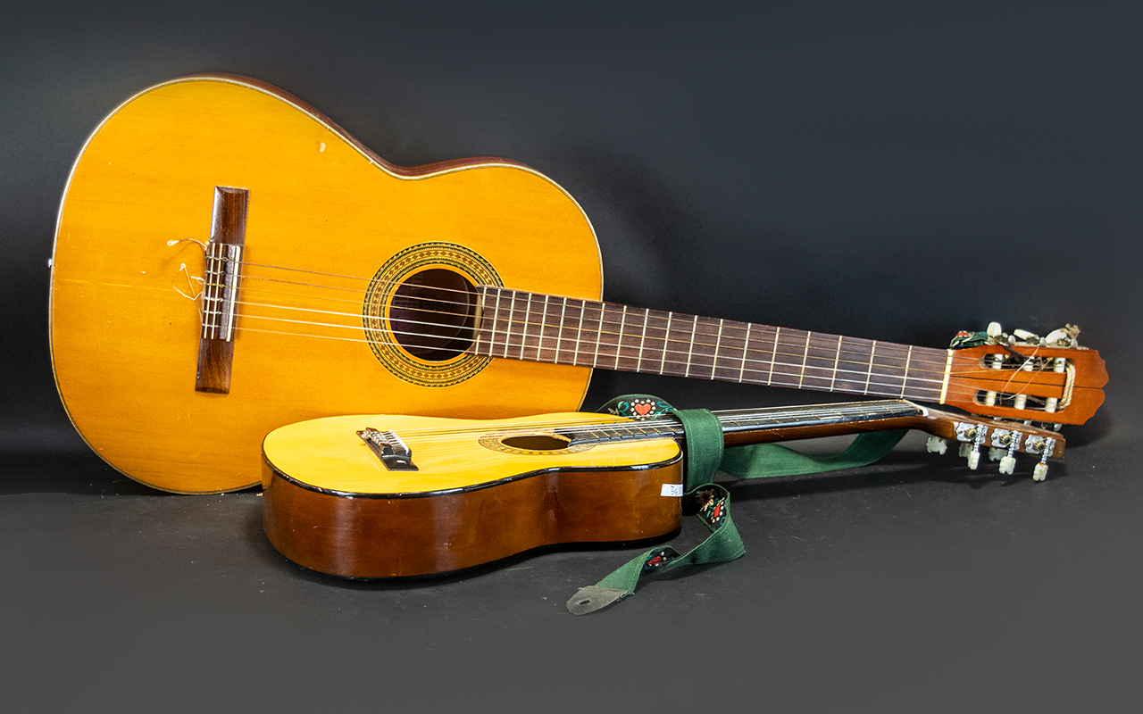 A Factory Made Acoustic Guitar with pape