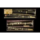 Two Vintage Clarinets, both in hard shel
