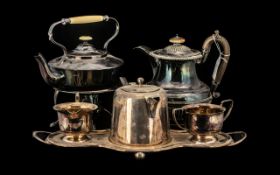 A Collection of Silver Plated Ware to include a spirit kettle and stand,