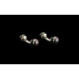 Fresh Water Peacock Pearl Cufflinks, each comprising a solid, curved, silver bar set with two