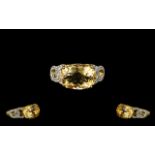 Citrine East-West Set Solitaire Ring, an oval cut citrine of 5cts set across the finger, East-West