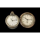 Two Smiths Vintage Car Clocks with silvered dials, no.134099; 3.5 inches (8.
