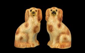 Pair of Antique Staffordshire Flatback Spaniels with glass eyes; 12 inches (30cms) high,