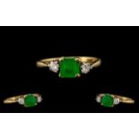 18ct Gold - Attractive Emerald and Diamond Set 3 Stone Ring. Hallmark London 1978.