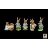 Beswick Beatrix Potter Figures five (5) in total. 1. Mrs Rabbit small size, umbrella moulded to