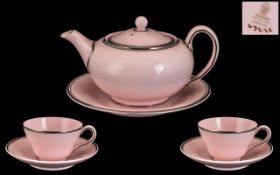 Wedgwood Alpine Tea for Two Set comprising of a Pink Teapot and Stand and 2 cups and saucers shown