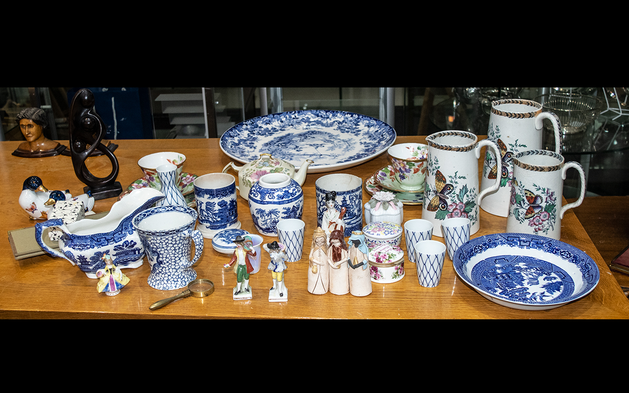 A Collection of Assorted Pottery to include a large blue and white charger,