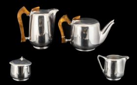 Four Piece Alloy Tea Set with wooden handles, by Newman, England,