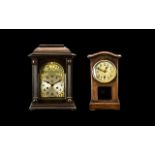 Early 20thC Wooden Cased Mantle Clock with silvered dial with Arabic Numerals with brass spandrels