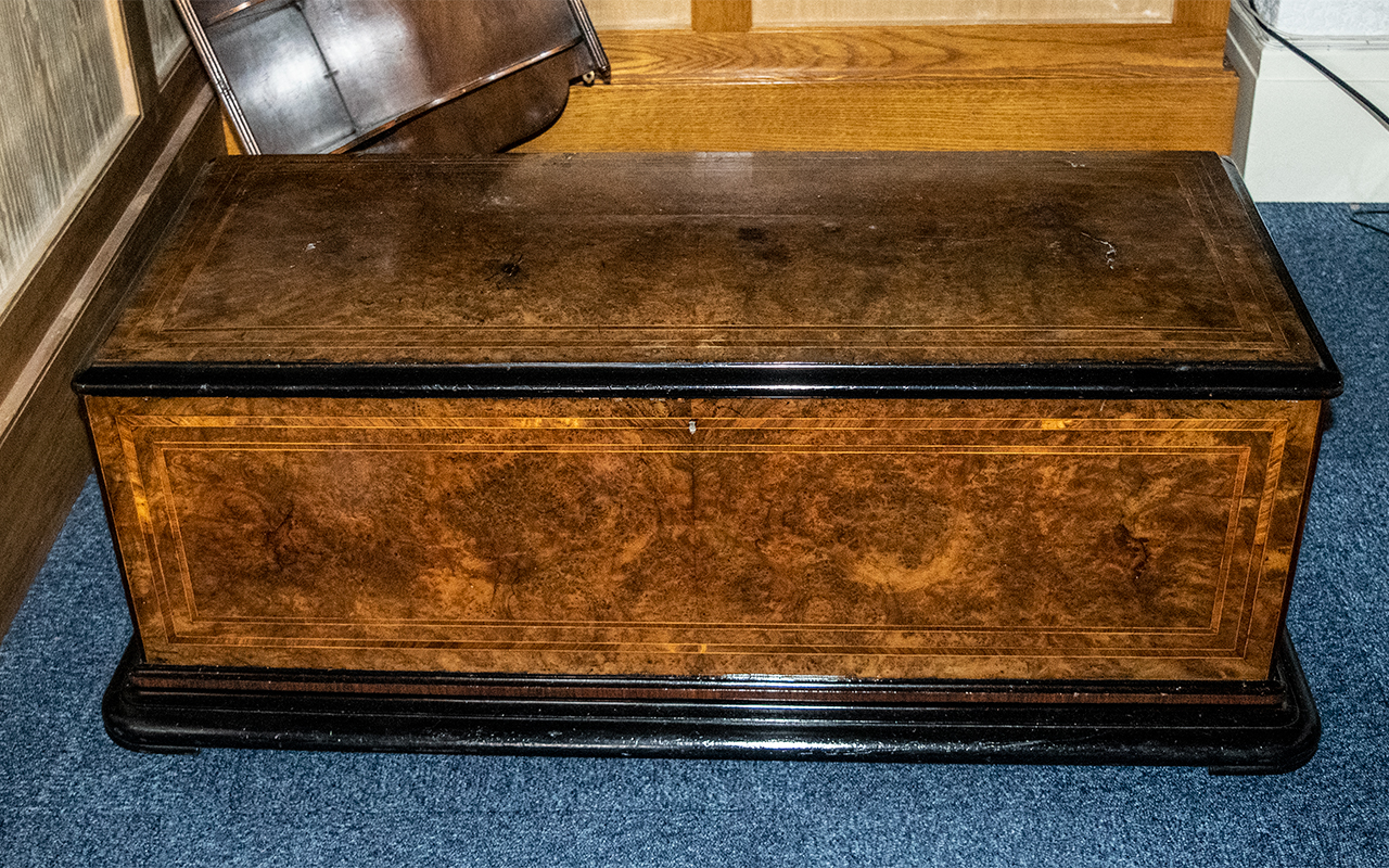 A Large Oversized Music Cylinder Box Carcus hinged top with brass carry handles with walnut veneer