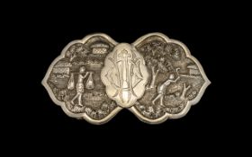 Large Antique Burmese Silvered Metal Belt Buckle of Petal Shape, embossed with figures farming;