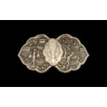 Large Antique Burmese Silvered Metal Belt Buckle of Petal Shape, embossed with figures farming;