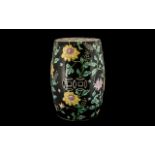 Oriental Pottery Garden Stool with famille noir decorations;
