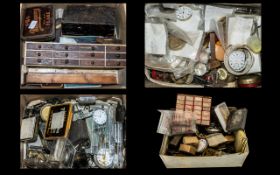 Four Boxes - A Large Quantity of Wrist Watch and Pocket Watch spare parts and works,