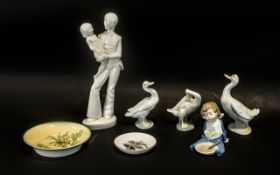 Collection of Lladro & Nao Porcelain, comprising: Nao figure of a seated toddler with a plate and