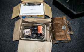 Raynox 8mm Super 8 Projector In Original Box, with a Vintage Projector and Reels of Films. A/F.