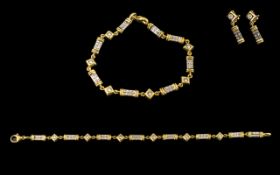 18ct Gold Two Tone Diamond Bracelet set with alternating links,