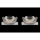 Fine Pair of Matching Sterling Silver Openwork Bon-Bon Dishes of pleasing proportions and design;