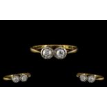 Antique Period 18ct Gold and Platinum Two Stone Diamond Set Ring.