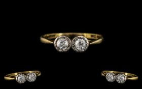 Antique Period 18ct Gold and Platinum Two Stone Diamond Set Ring.