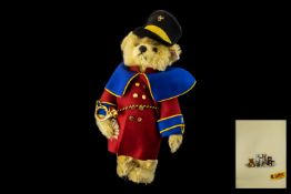 Heinrich the Postman Bear Made by Steiff. The jointed bear has a coat of blond mohair with tan