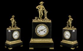 A French Gilt Brass Figural Clock with white enamel dial and Roman Numerals,