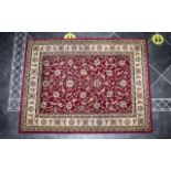 Traditional Wool Rug, in burgundy colour with cream and gold borders, in good condition.